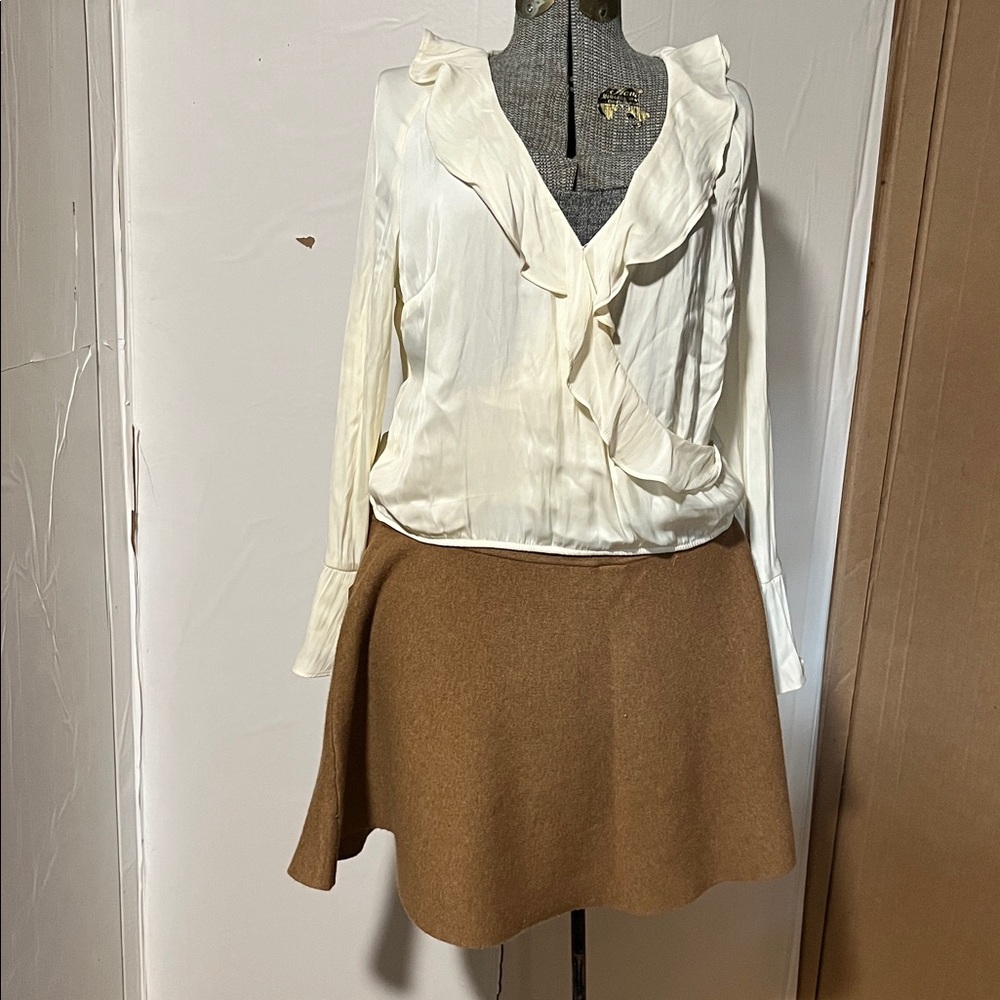A New Day Cream Ruffled Blouse. Long sleeves size Medium.